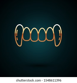 Gold line Vampire teeth icon isolated on dark blue background. Happy Halloween party.  Vector Illustration