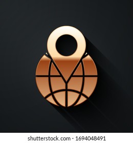 Gold Location on the globe icon isolated on black background. World or Earth sign. Long shadow style. Vector Illustration