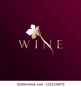 Gold logo for the wine business. Wine. Grape leaf. Vector stock.