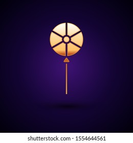 Gold Lollipop icon isolated on dark blue background. Food, delicious symbol.  Vector Illustration