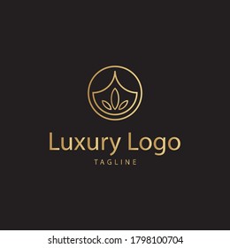 Diseño de logotipo de lujo dorado. vector