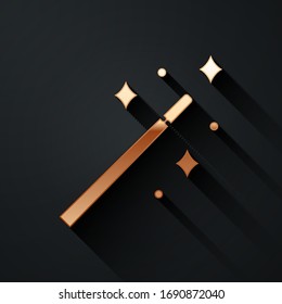 Gold Magic wand icon isolated on black background. Star shape magic accessory. Magical power. Long shadow style. Vector Illustration