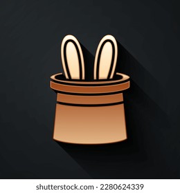 Gold Magician hat and rabbit ears icon isolated on black background. Magic trick. Mystery entertainment concept. Long shadow style. Vector