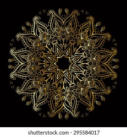 Gold mandala on black background. Ethnic vintage pattern.