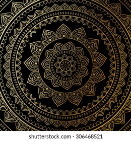 Mandala de oro sobre fondo negro. Patrón vintage étnico.