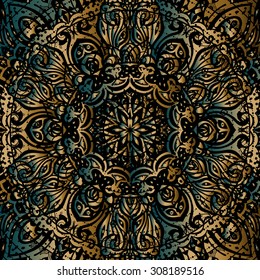 Gold mandala on black background. Ethnic vintage pattern.