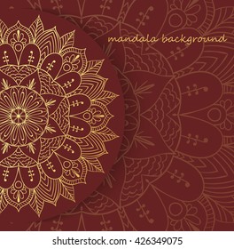 gold mandala on a brown background