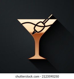 Gold Martini glass icon isolated on black background. Cocktail icon. Wine glass icon. Long shadow style. Vector