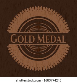 Gold Medal badge with wooden background