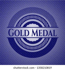 Gold Medal emblem with jean background