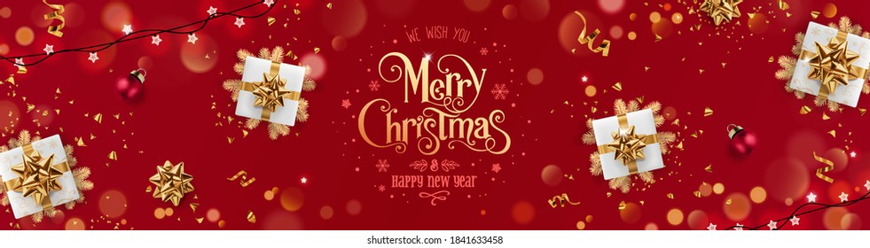 Gold Merry Christmas and New Year text on red holiday background with gift boxes, fir branches, ribbons, decoration, sparkles, confetti, bokeh, light. Xmas card. Vector Illustration, realistic vector