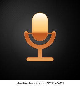 Gold Microphone icon isolated on black background. On air radio mic microphone. Speaker sign. Vector Illustration