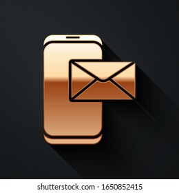 Gold Mobile and envelope, new message, mail icon isolated on black background. Usage for e-mail newsletters, headers, blog posts. Long shadow style. Vector Illustration