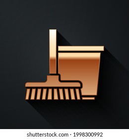 Gold Mop and bucket icon isolated on black background. Cleaning service concept. Long shadow style. Vector