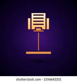 Gold Music stand icon isolated on dark blue background. Musical equipment.  Vector Illustration