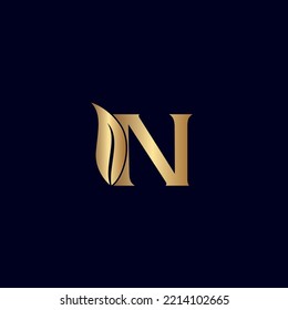 gold N leaf letter logo design