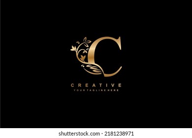 diseño del logo de oro N con lujosa y hermosa decoración de flores, plumas, hojas. Monograma. N tipografía. logo de la pluma de oro. logotipo de la letra inicial N. adecuado para viajes de negocios, bodas, boutique, 