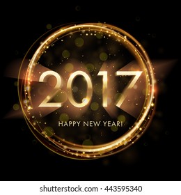 Gold New Year 2017 card. Black background with glowing sparkle circle. Star dust sparks with 2017 Happy New Year text in explosion on black background. Vector Illustration