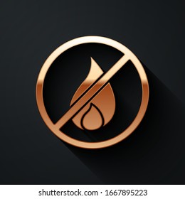 Gold No fire icon isolated on black background. Fire prohibition and forbidden. Long shadow style. Vector Illustration