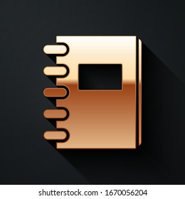 Gold Notebook icon isolated on black background. Spiral notepad icon. School notebook. Writing pad. Diary for school. Long shadow style. Vector Illustration
