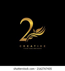 Gold number 2 logo vector design with leaf decoration. monogram number 2, number typography. feather logo. number 2 luxury. anniversary 2