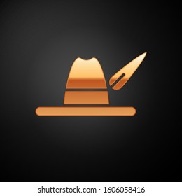 Gold Oktoberfest hat icon isolated on black background. Hunter hat with feather. German hat.  Vector Illustration