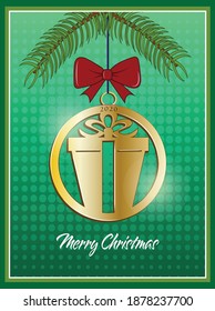 A gold ornament hanging from a tree branch.