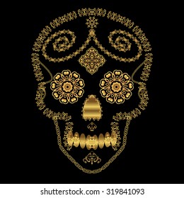 Gold ornamental sugar skull. Dia de los Muertos (Day of the Dead). 