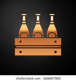 Gold Pack of beer bottles icon isolated on black background. Wooden box and beer bottles. Case crate beer box sign.  Vector Illustration