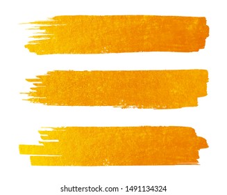 Gold paint brush strokes set