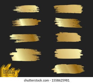 Gold paint brush. Vector golden hand painted smear stroke stain. Abstract art background. Collection of golden paint strokes. illustration - Vector