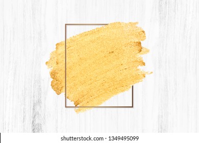 Gold paint with a golden rectangle frame on a bleached wood background vector