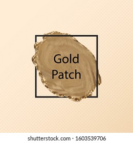 gold paint patch inside black square frame over gradient polka dots background  