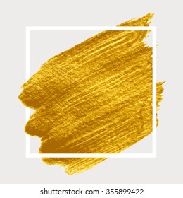 Gold paint in white square. Brush strokes for the background of poster. 