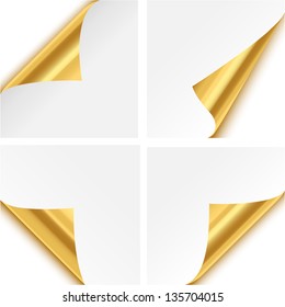 Gold Paper Corner Folds - Set of four gold paper corner folds isolated on white background.