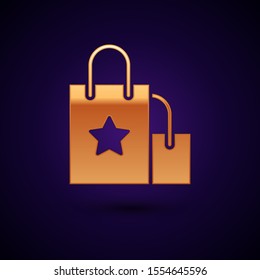 Gold Paper shopping bag icon isolated on dark blue background. Package sign.  Vector Illustration