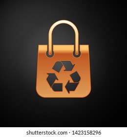 Gold Paper shopping bag with recycle icon isolated on black background. Bag with recycling symbol. Vector Illustration