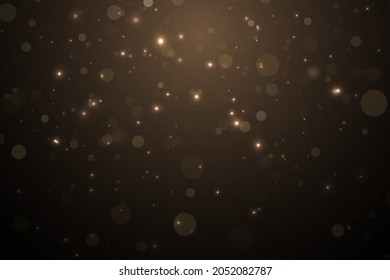 Partículas de oro. Efecto ligero. Polvo de oro. decoración de fondo.