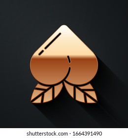 Gold Peach fruit or nectarine with leaf icon isolated on black background. Long shadow style. Vector Illustration