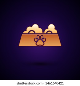 Gold Pet food bowl for cat or dog icon isolated on dark blue background. Dog or cat paw print.  Vector Illustration