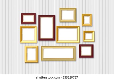 gold picture set on white wood wall