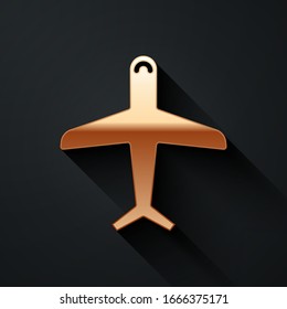 Gold Plane icon isolated on black background. Flying airplane icon. Airliner sign. Long shadow style. Vector Illustration