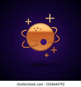 Gold Planet icon isolated on dark blue background.  Vector Illustration