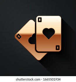 Gold Playing cards icon isolated on black background. Casino gambling. Long shadow style. Vector Illustration