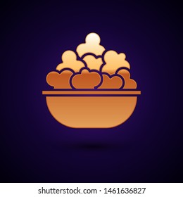 Gold Popcorn in bowl icon isolated on dark blue background. Popcorn bucket box.  Vector Illustration