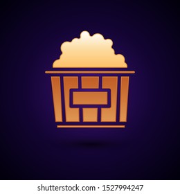 Gold Popcorn in cardboard box icon isolated on dark blue background. Popcorn bucket box.  Vector Illustration