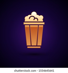 Gold Popcorn in cardboard box icon isolated on dark blue background. Popcorn bucket box.  Vector Illustration