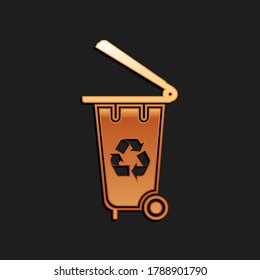 Gold Recycle bin with recycle symbol icon isolated on black background. Trash can icon. Garbage bin sign. Recycle basket icon. Long shadow style. Vector.