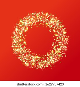 Gold ring made of sparkling gold pieces with copy space on a red background.