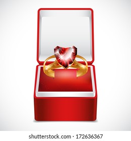 Gold ring with pink heart gemstone in Red Velvet Box (vector).